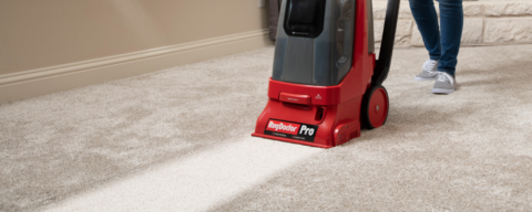 RugDoctor Pro leaving a brighter path through dirty carpet.